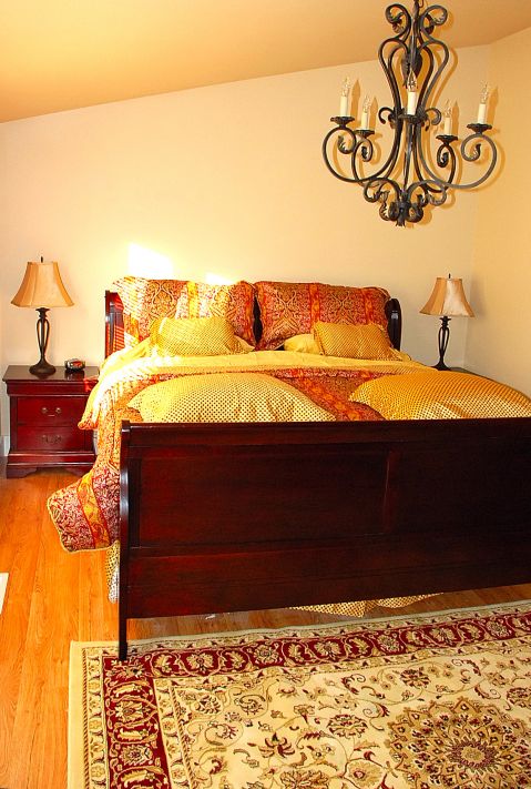 King sleigh bed, chandelier